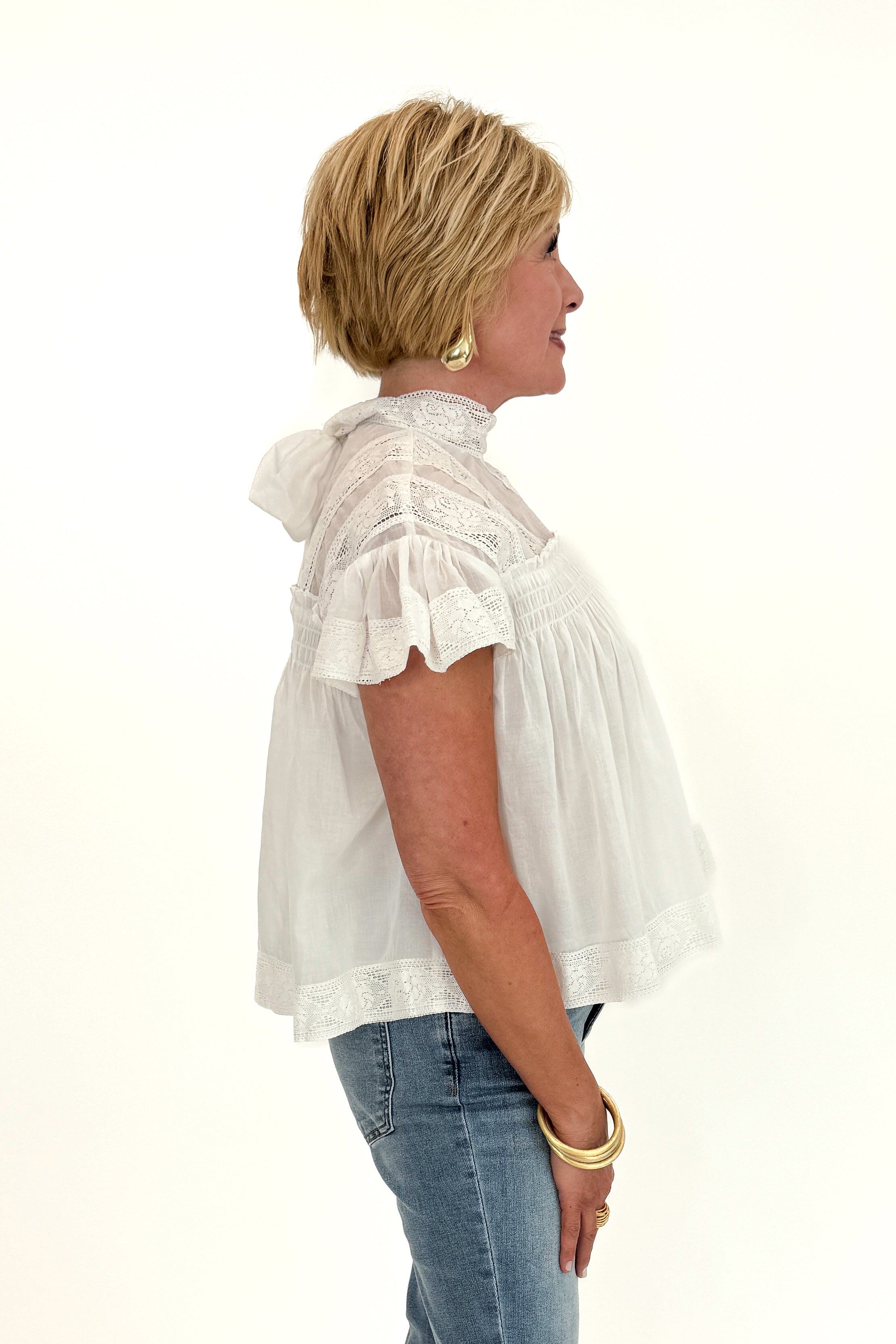 Side view of woman wearing Swagger Boutique&