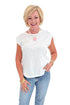 Front view of woman wearing Swagger Boutique’s White Sol Slub Tank by Z Supply with jeans against white studio background.