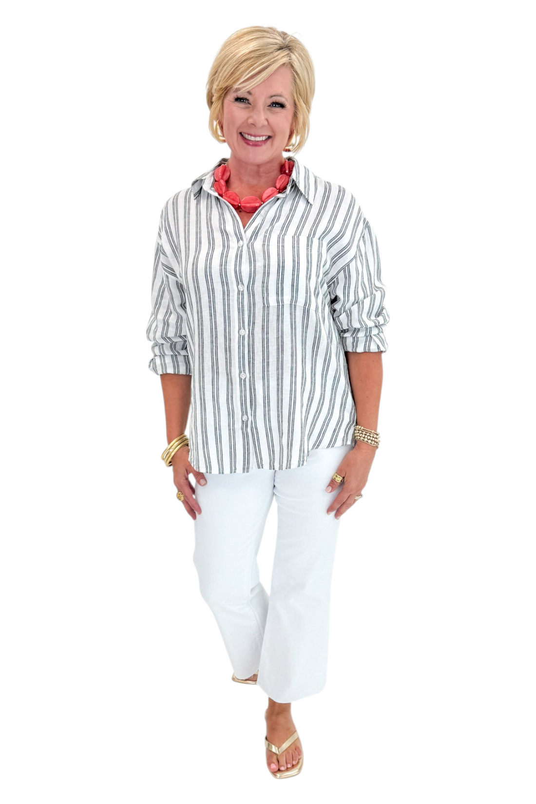 Front view of woman wearing Swagger Boutique’s White The Perfect Striped Button Up Top by Z Supply with jeans against white studio background.