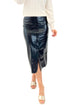 Front view of woman wearing top with Black Reine Faux Leather Skirt by Z Supply against white studio background.