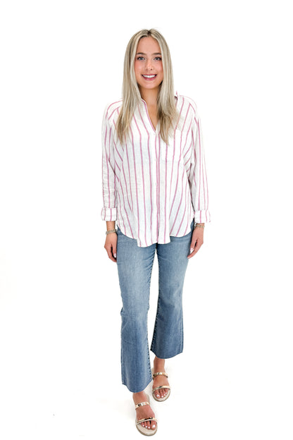 Front view of woman wearing The Perfect Line Top In Spanish Rose by Z Supply with jeans against white studio background.