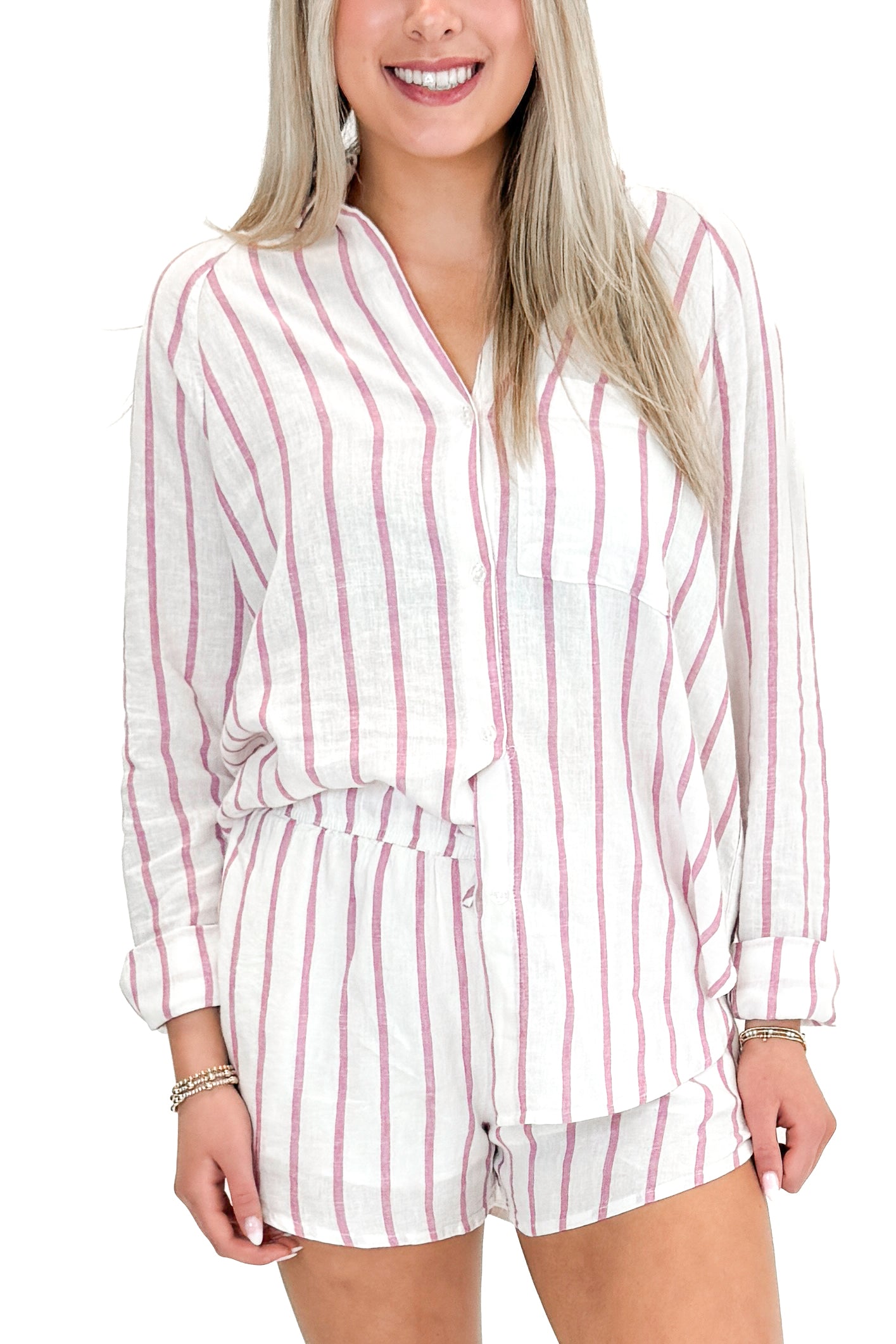 Front view of woman wearing The Perfect Line Top In Spanish Rose by Z Supply with matching shorts against white studio background.