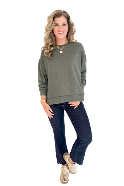 Woman wearing Modern Weekender In Artichoke by Z Supply - front view showing relaxed fit and artichoke green color