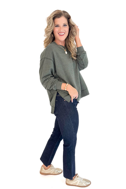 Woman wearing Modern Weekender In Artichoke by Z Supply - side view showing relaxed fit and artichoke green color