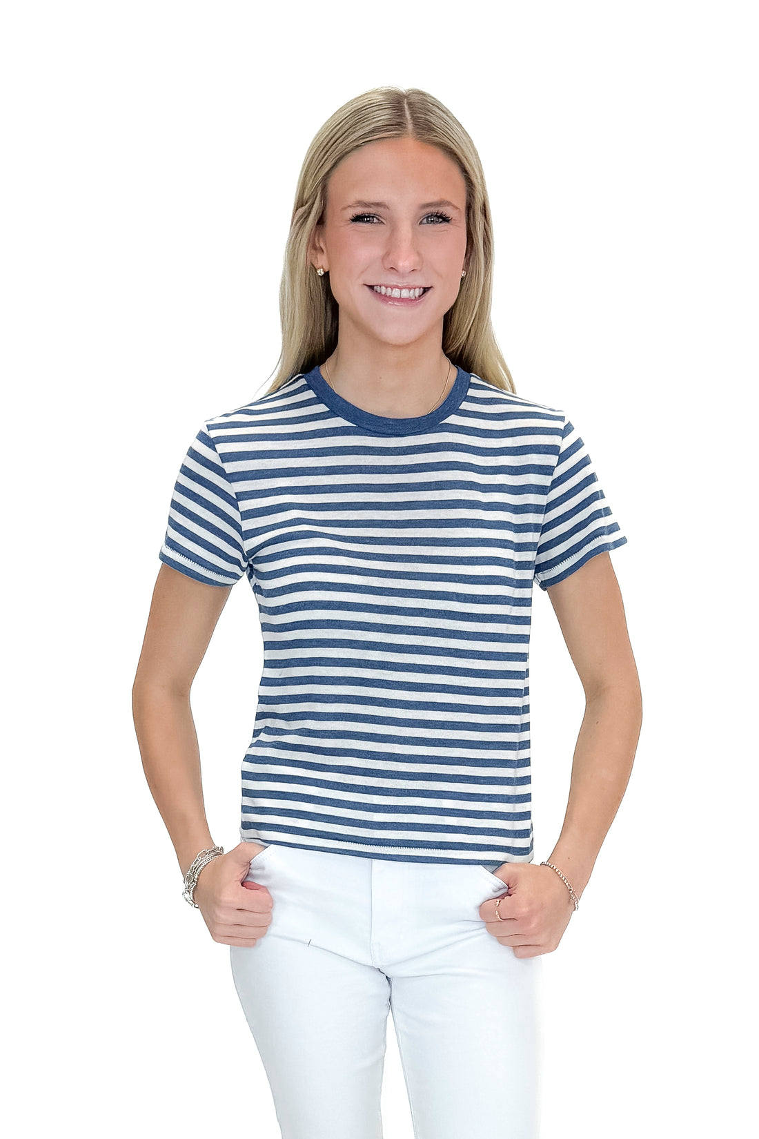 Front view of woman wearing Calypso Blue Indigo Tourist Striped Tee by Z Supply with jeans against white studio background.