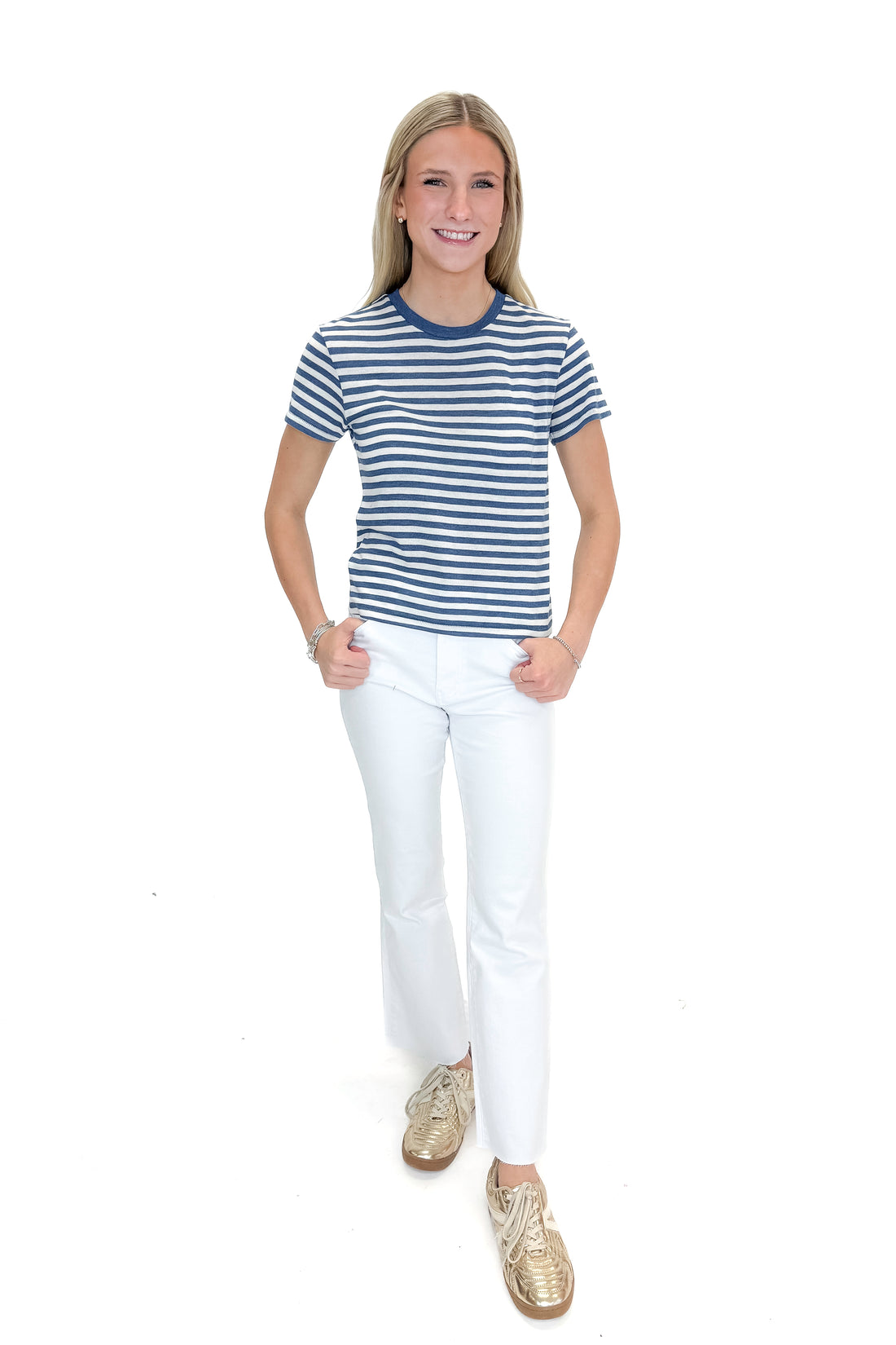 Front view of woman wearing Calypso Blue Indigo Tourist Striped Tee by Z Supply with jeans against white studio background.