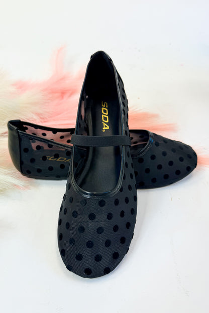 Zenda- Black Polka Dot Mesh Flat against studio background