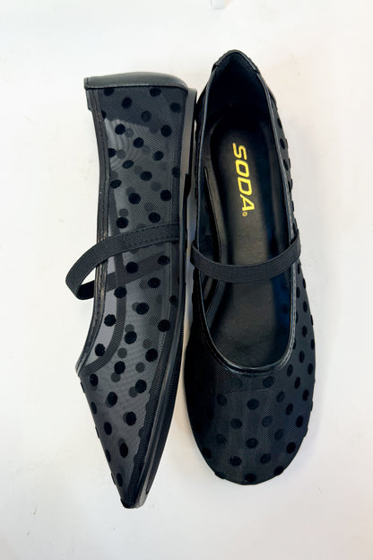 Zenda- Black Polka Dot Mesh Flat against studio background