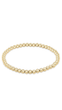 A gold beaded stretch bracelet with polished spherical beads, displayed on a clean white background.