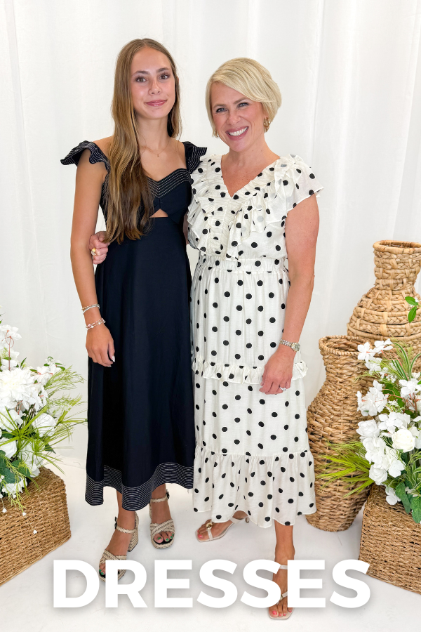 two women wearing black and white dresses with "dresses" text overlay