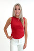 Front view of woman wearing Red Round Hem Ribbed Tank with jeans against white studio background.