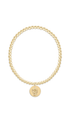 A gold beaded stretch bracelet with a circular medallion charm featuring an nc state mascot, displayed on a clean white background.
