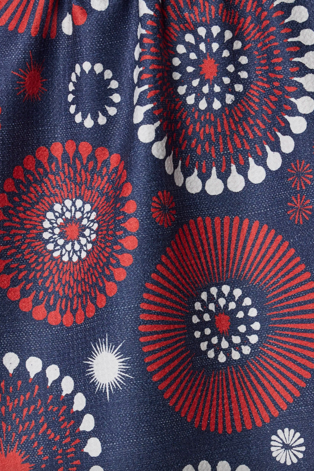 Close-up of fabric with red, white, and blue geometric pattern
