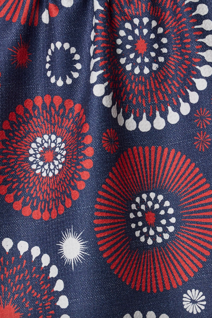 Close-up of fabric with red, white, and blue geometric pattern