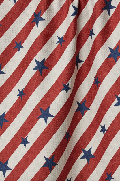 Fabric with red and white diagonal stripes and blue stars