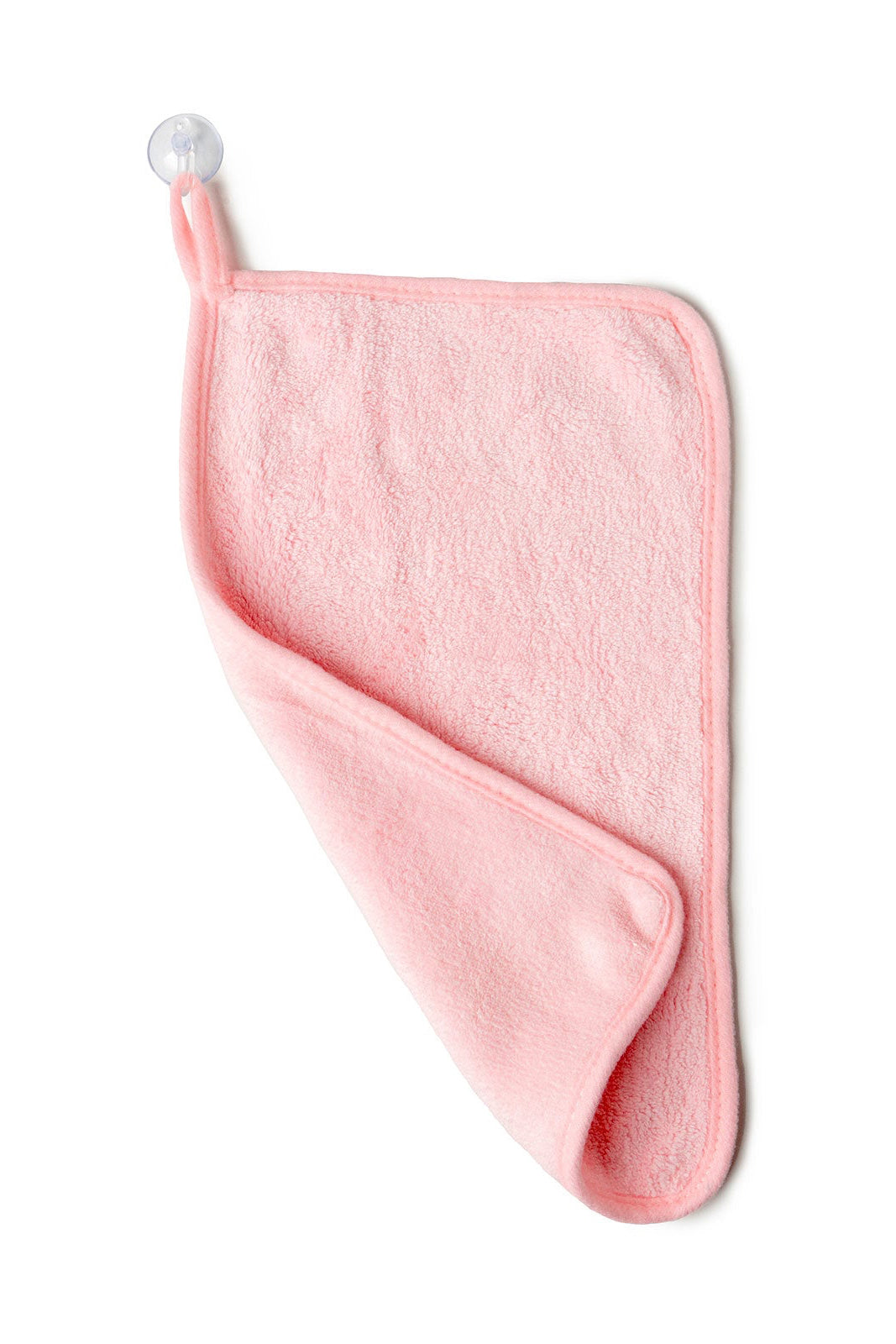 Pink towel on a white background