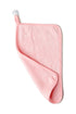 Pink towel on a white background