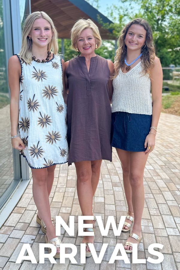 Three women standing together outdoors with 'NEW ARRIVALS' text overlay.