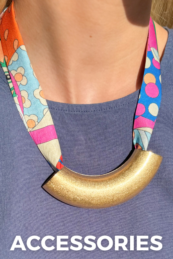Colorful strap with a gold accessory on a blue background, labeled 'ACCESSORIES'.